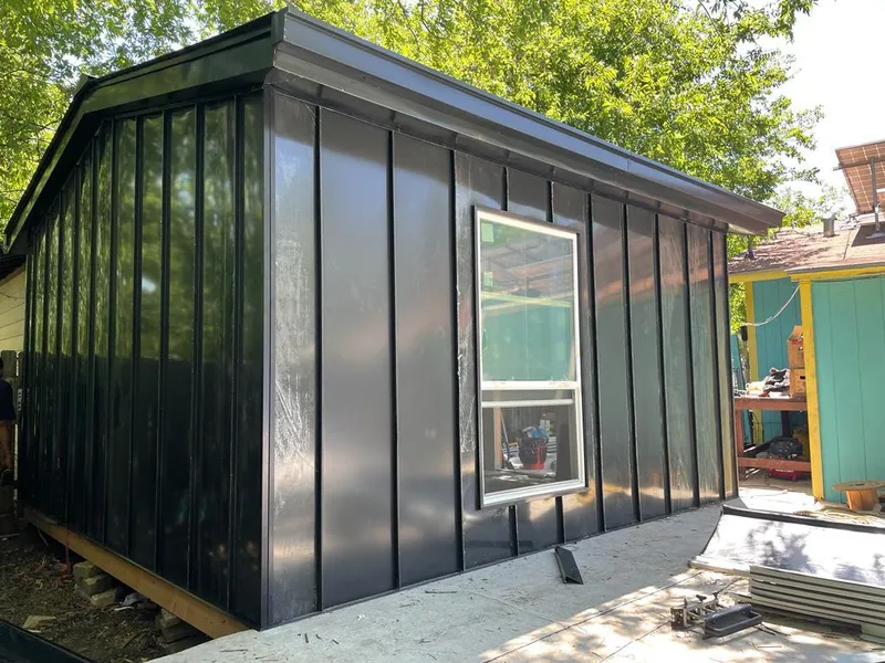 Black standing seam metal wall panels for Roof Inspection in Cottage Lake